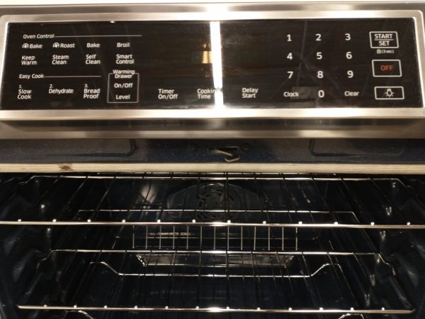 USED LESS THAN 1 YEAR SLIDE IN INDUCTION STOVE SAMSUNG NE58K9560WG/AC